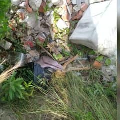 Rescuer Shocked To Find Brown Legs Sticking Out From A Pile Of Garbage