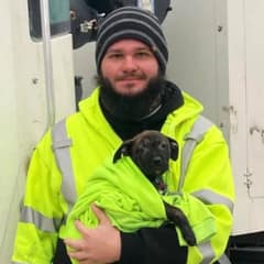 Trash Truck Driver Finds Broken Puppy in a Backpack and Refuses To Leave Her Behind